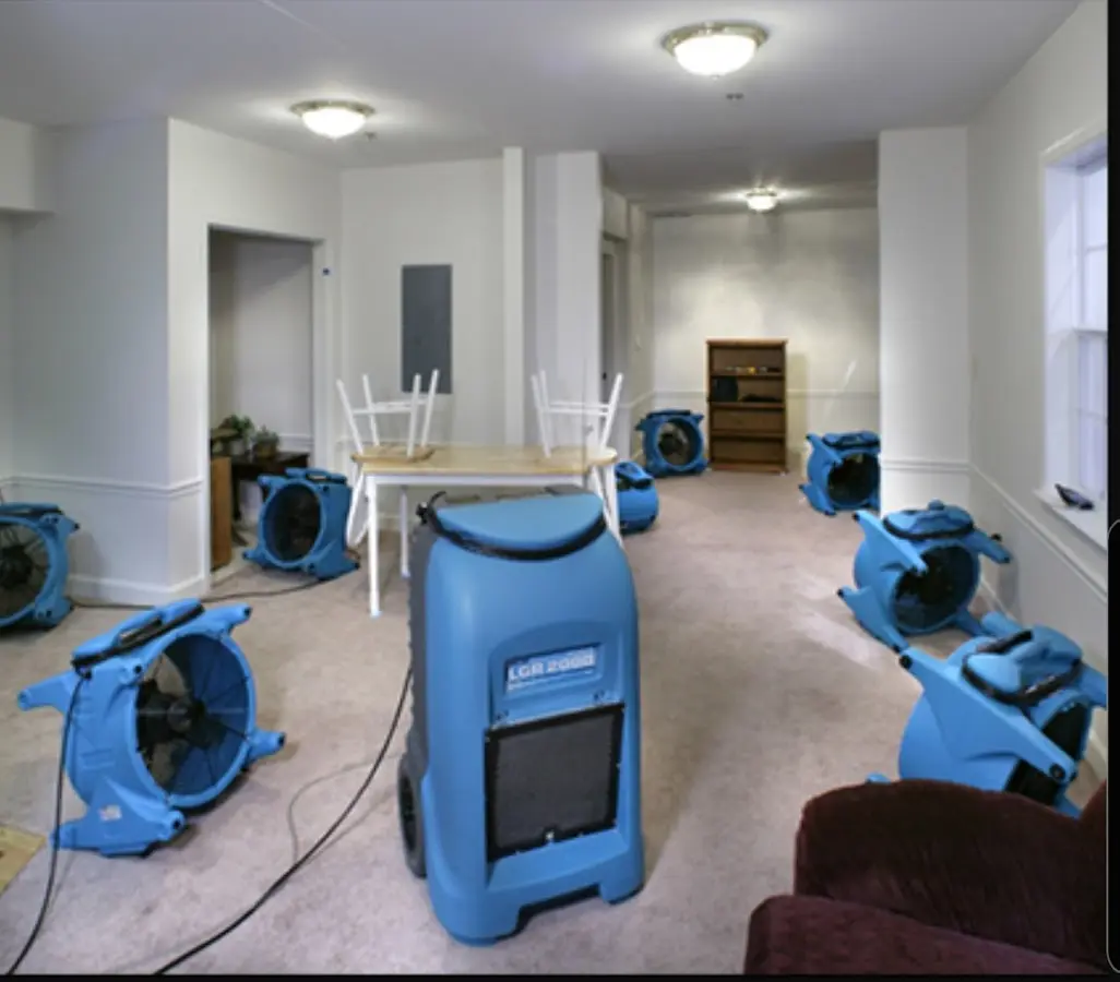 Air movers and dehumidifier setup for Water Damage Restoration in Vail
